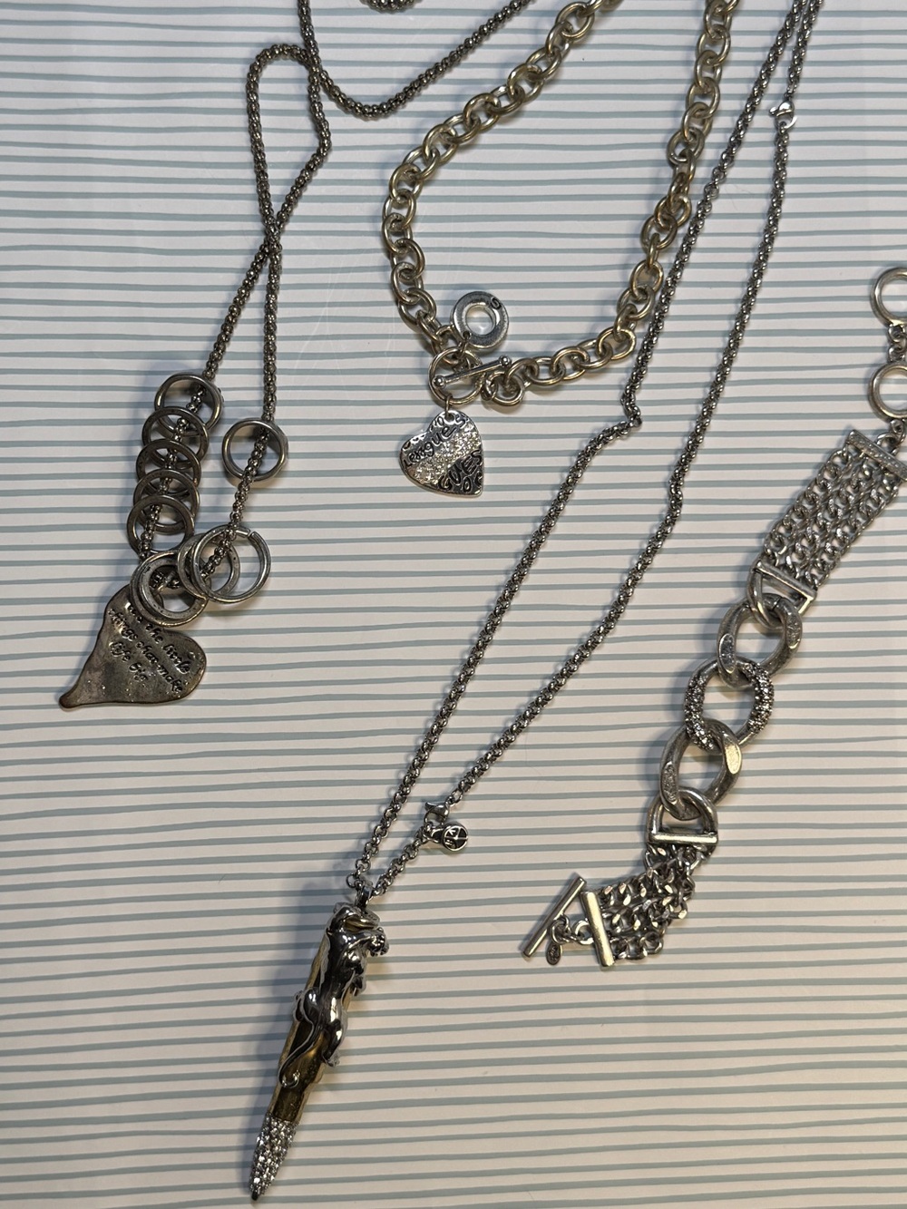 Lot of Fashion Jewelry including a Bullets 4 Peace Signature Collection Pendant